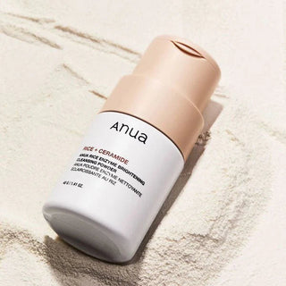 Anua Rice Enzyme Brightening Cleansing Powder in a 40g jar, showcasing the powder's texture and packaging.