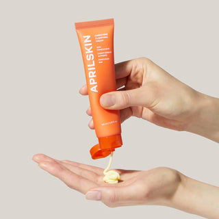 April Skin Carrotene Clarifying Cream 60ml jar showing the smooth, white cream inside a clear container with branding on the label.