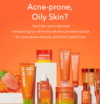 April Skin Carrotene Clarifying Cream jar showing the white and orange packaging, with the product label visible on the full-sized container.