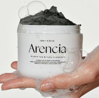 Arencia Black Tea Rice Mochi Cleanser 120g in a white tube, featuring black tea and rice mochi ingredients for gentle facial cleansing.