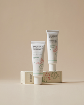 AXIS-Y Panthenol 10 Skin Smoothing Shield Cream 50ml jar with creamy texture and sleek packaging.