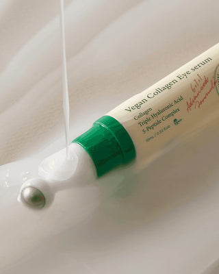 A close-up of Axis-Y Vegan Collagen Eye Serum in a 10mL tube, designed for nourishing and hydrating the delicate eye area.