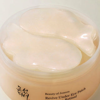 Beauty of Joseon Revive Under Eye Patch with ginseng and retinal, displayed in a box of 60 patches for revitalizing eye care.