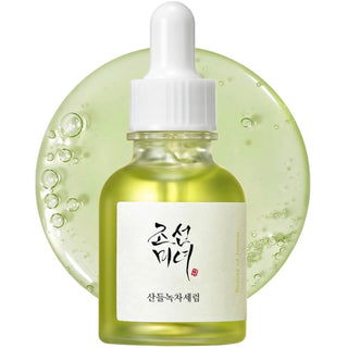 Beauty of Joseon Calming Serum with green tea extract, featuring a dropper and glass bottle for soothing skincare.