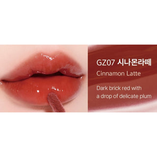 Black Rouge Chewy Lip Glaze lipstick in Peach Blossom, showcasing the smooth, glossy finish and vibrant peach color.