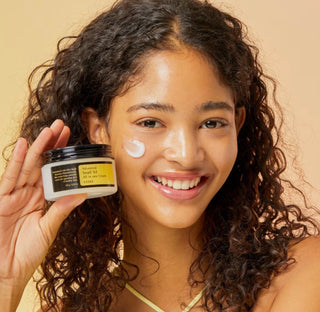 Cosrx Advanced Snail 92 All In One Cream moisturizer in a jar, smooth texture, with snail extract for hydrating skin.