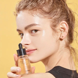 CosRX Full Fit Propolis Light Ampoule serum in a clear bottle with a white dropper, showcasing the product label.
