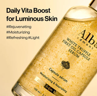 D'Alba White Truffle First Oil Capsule Serum bottle, 100ml, with elegant packaging and product label visible.