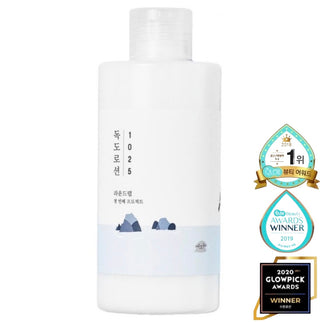 Damaged box of Round Lab 1025 Dokdo Lotion emulsion with 70 Medicube Zero Pore Pads in a sealed package.