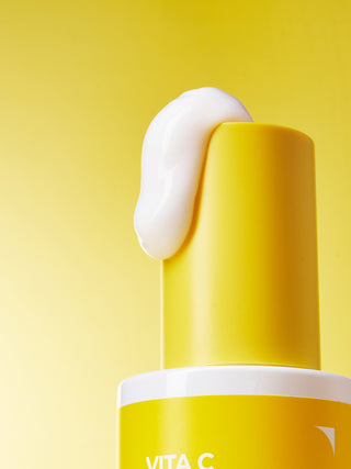 Deoproce VITA C Toning Care Fluid Emulsion bottle with a clear liquid, designed for skin hydration and brightening.