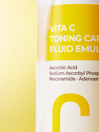 Deoproce VITA C Toning Care Fluid Emulsion bottle showing the product label and packaging details.