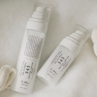 Dr. Althea 345 Relief Cream Mist bottle with spray nozzle, light-colored label, and clear packaging, showcasing the product.