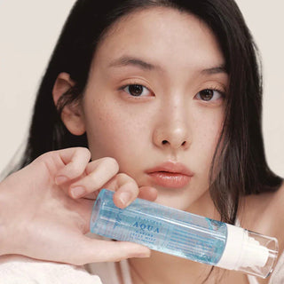 Dr. Althea Aqua Marine Jelly Mist 100ml, a facial mist with a clear bottle and spray nozzle, showcasing the hydrating product.