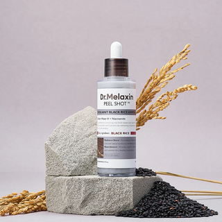 Dr.Melaxin Peel Shot Exfoliating Black Rice Ampoule 80ml bottle with black rice extract for skin renewal and brightening.