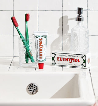 Euthymol Original fluoride-free toothpaste in 75ml tube with distinctive red and white packaging.