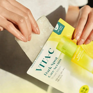 Goodal Green Tangerine Vita C dark spot care serum sheet mask showing the packaged face mask in its wrapper.