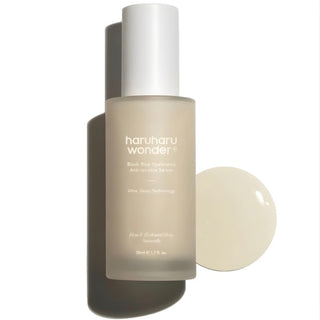 Haruharu Wonder Black Rice Hyaluronic Anti-Wrinkle Serum 50mL in a dark glass bottle with a pump dispenser.