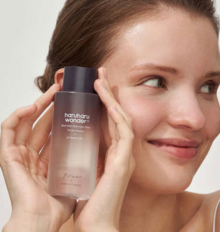 Haruharu Wonder Black Rice Hyaluronic Toner in a clear bottle, fragrance-free skincare product for hydration and gentle cleansing.