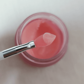 Laneige Lip Sleeping Mask EX in pink, 3g jar, nourishing overnight lip treatment with a smooth, glossy finish.