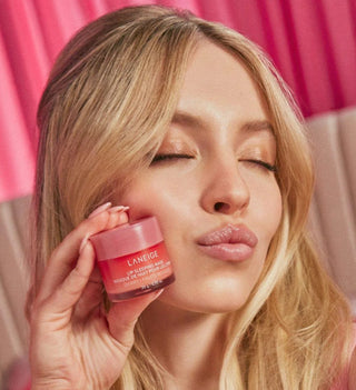 Laneige Lip Sleeping Mask EX in pink, a hydrating overnight lip treatment in a small jar.