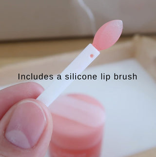 Laneige Lip Sleeping Mask EX in pink, a hydrating overnight lip treatment in a small jar with a smooth, glossy finish.