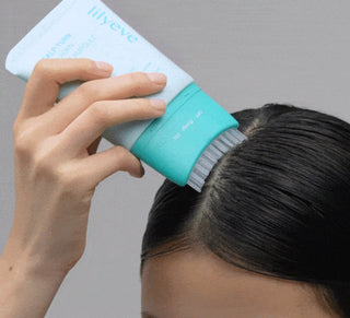 Lilyeve Scalp Turn Cica PDRN Brush Ampoule 100ml bottle, featuring a white and blue cap with the product label visible.