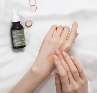 Mary&May Houttuynia Cordata and Tea Tree Serum, a skincare serum in a glass bottle with dropper applicator.