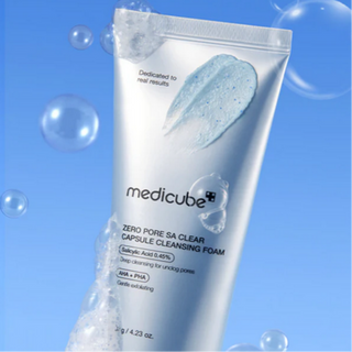 Medicube Zero Pore Clearing Capsule Cleansing Foam in a 120g bottle, showing the foaming and cleansing action on skin.