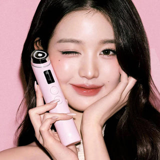 Medicube Age-R Booster Pro skincare tool in pink, designed for facial skincare and anti-aging treatment.