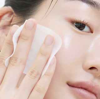 Mediheal Vitamide Brightening Pad toner pads in a 180ml container, showing 100 brightening treatment pads for skincare.