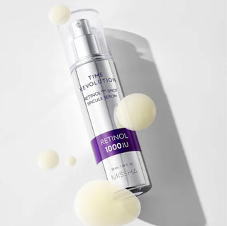 MISSHA Time Revolution Retinol 1000 Spicule Serum 50ml displayed in a clear glass bottle with a pump dispenser.