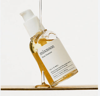 Mixsoon Bean Essence in a 30ml bottle, featuring clear liquid and minimalist label design, ideal for skincare routines.