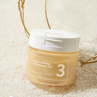 Numbuzin No.3 Radiance Glowing Jumbo Essence Pad showing the large, soft cotton pad with nourishing essence for bright, radiant skin