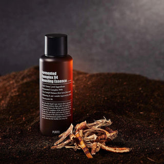 Purito Seoul Fermented Complex 94 Boosting Essence bottle with dropper, showcasing clear liquid and product label.