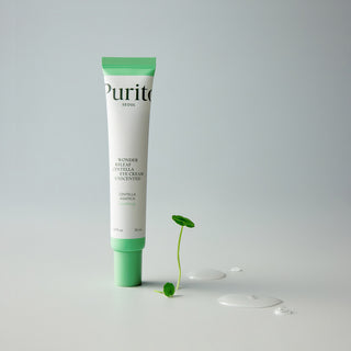 Purito Seoul Wonder Releaf Centella Eye Cream unscented in 30mL tube, shown with its packaging and applicator.