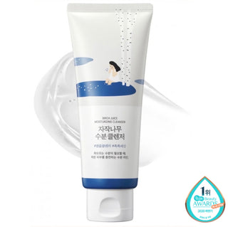 ROUND LAB Birch Juice Moisturizing Cleanser in a white bottle, showcasing its label and product details.