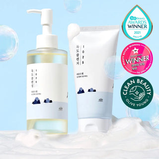 ROUND LAB 1025 Dokdo Cleansing Oil in a 200ml bottle, clear liquid with a pump dispenser, designed for gentle facial cleansing.