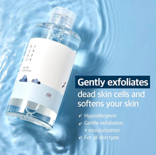 Round Lab 1025 Dokdo Toner in a clear bottle, showing its label and liquid, designed for gentle skincare and hydration.