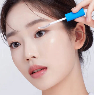Seapuri Lashrum eyelash enhancing serum in a 10g tube, designed to improve lash length and fullness naturally.