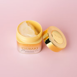 Shiseido Tsubaki Premium EX Repair Hair Mask in a 180g jar, showcasing creamy hair treatment for damaged hair repair.