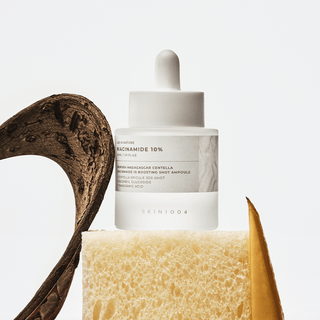 Skin1004 Madagascar Centella Niacinamide 10% Boosting Shot Ampoule 30ml bottle with clear label and dropper cap.