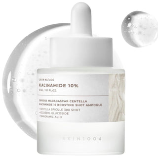 Skin1004 Madagascar Centella Niacinamide 10% Boosting Shot Ampoule in a clear 30ml bottle, with a dropper cap and label.