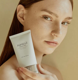 Skin1004 Madagascar Centella Soothing Cream moisturizer jar with green and white packaging, ideal for calming and hydrating skin.