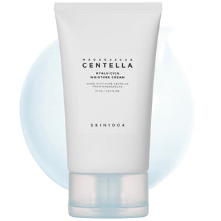 Skin1004 Madagascar Centella Hyalu-Cica Moisture Cream jar with label, showing the moisturizer's packaging and product details.