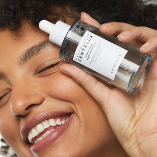 Skin1004 Madagascar Hyalu-cica First Ampoule serum in a 50ml bottle, featuring a clear liquid with a minimalist label.