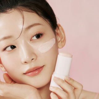 Skin1004 Madagascar Centella pore-minimizing quick clay stick mask in a sleek skin balm stick for deep cleansing.