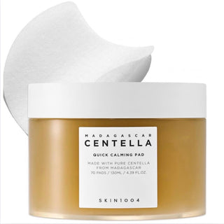 Skin1004 Madagascar Centella Calming Pads, toner pads with soothing ingredients, shown in a clear container with product label visible.