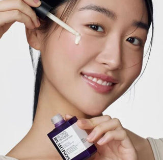 Some By Mi Retinol Intense Reactivating Serum in a clear glass bottle with a white dropper applicator, designed for skincare.