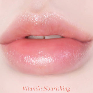 Tocobo Vitamin Nourishing Lip Balm in 3.5g container, smooth texture with moisturizing and nourishing properties for lips