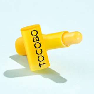 Tocobo Vitamin Nourishing Lip Balm in 3.5g container, smooth and moisturizing lip care product with vitamin enrichment.